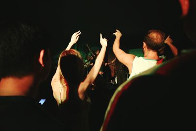 People enjoying at concert