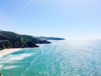 Scenic view of sea against clear blue sky