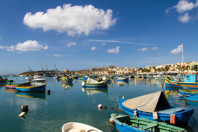 Boats moored in harbor