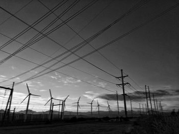 Power lines against sky