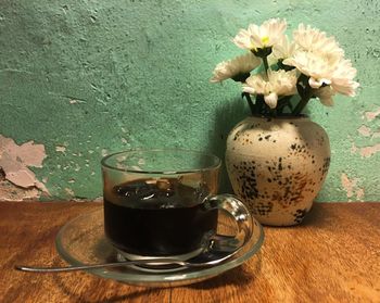 Close-up of flowers in vase on table