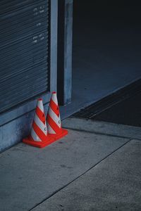 Low section of woman standing on street