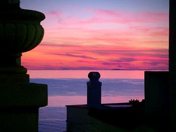 Scenic view of sea at sunset