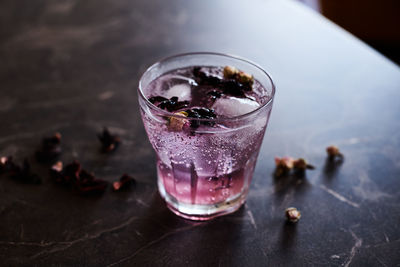 Close-up of glass of ice on table