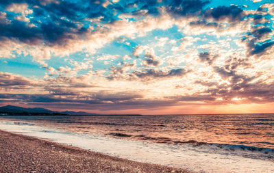 Scenic view of sea against sky during sunset