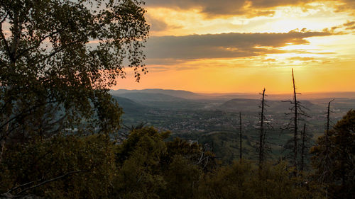 Scenic view of landscape against sky during sunset