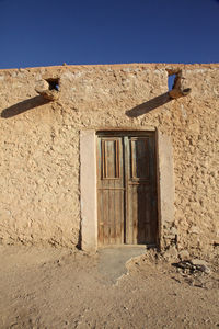 Closed door at old ruin