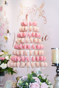Close-up of macaroons on cakestand at wedding ceremony