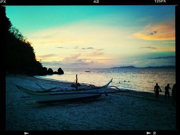 Scenic view of sea at sunset