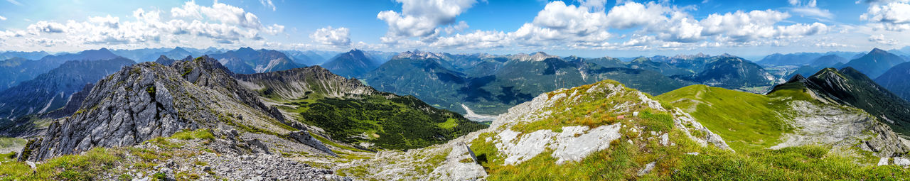 Panoramic view of landscape and mountains against sky