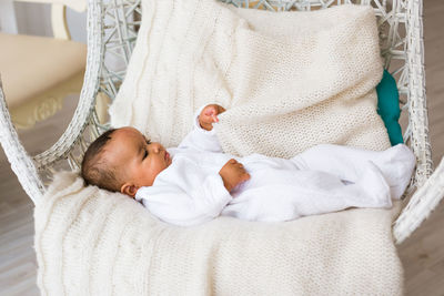 Cute baby sleeping on bed