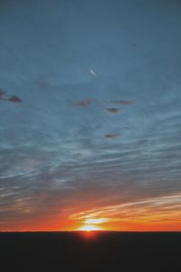 Scenic view of dramatic sky during sunset