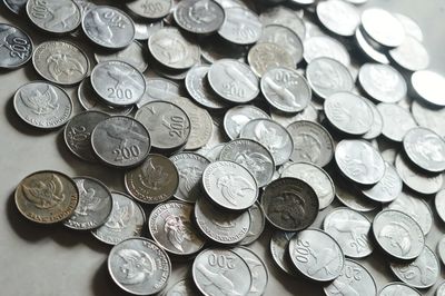 High angle view of coins on table