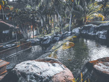 View of river flowing through rocks