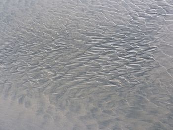 Full frame shot of sand on beach