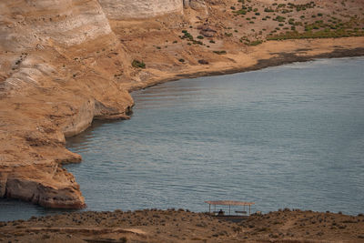 Aerial view of lake powell by rock formation