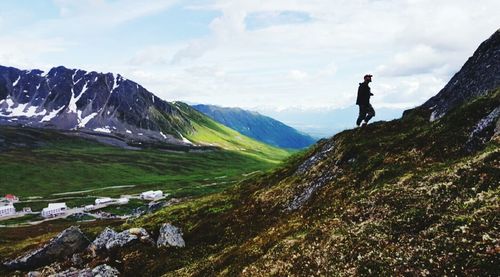People hiking on mountain landscape