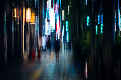 View of illuminated street at night