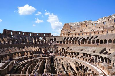 Amphitheater against sky in city