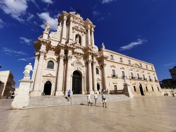 Group of people in front of building