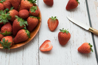 High angle view of strawberries on table