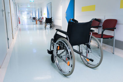 Wheelchair in the hospital hall. hospital interior. medical healthcare concept