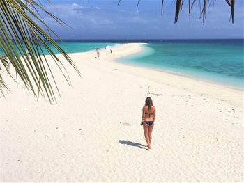 Full length of woman on beach