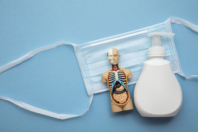 High angle view of dental equipment against blue background