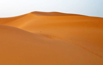 Scenic view of desert against sky