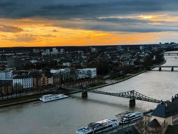 High angle view of bridge over river against buildings
