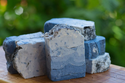Blue handmade soap on a green background
