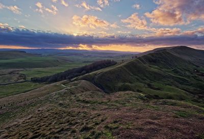 Scenic view of landscape against sky during sunset