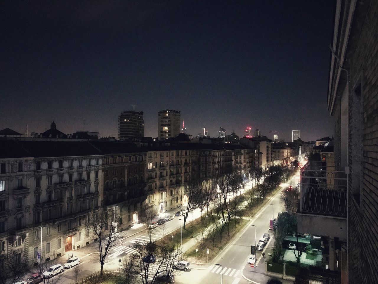 CARS ON CITY STREET AT NIGHT