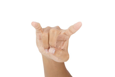 Close-up of human hand against white background