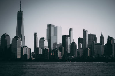 Modern buildings in city against sky