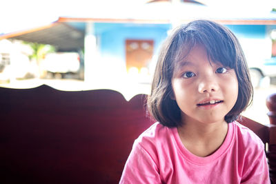 Portrait of cute girl looking away