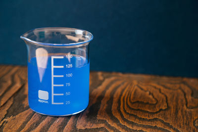 Close-up of liquid in container on table