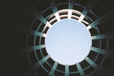 Directly below shot of circular building against clear sky