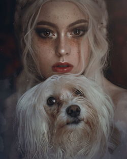 Portrait of woman with dog