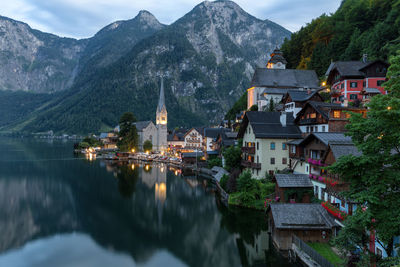 Panoramic view of lake and buildings in town