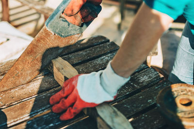 High angle view of man working on wood