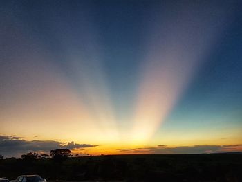 Scenic view of silhouette landscape against sky during sunset