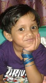 Close-up portrait of smiling girl