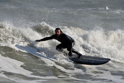 Man surfing in sea