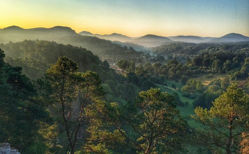 Scenic view of mountains against sky during sunset