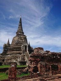 Low angle view of old temple building against sky