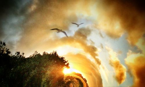 Scenic view of cloudy sky at sunset