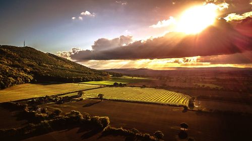 Scenic view of landscape against sky during sunset