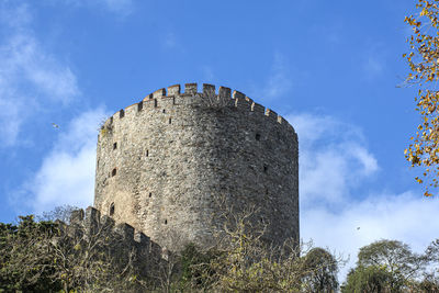 Low angle view of fort against blue sky