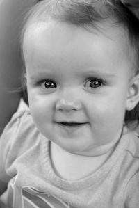 Close-up portrait of cute girl smiling